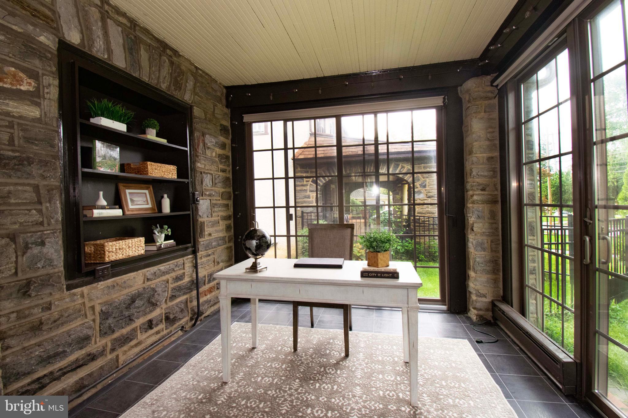 501 East Manoa Road Havertown, PA 19083 - Photo 12 of 42 a living room with furniture large window and wooden floor