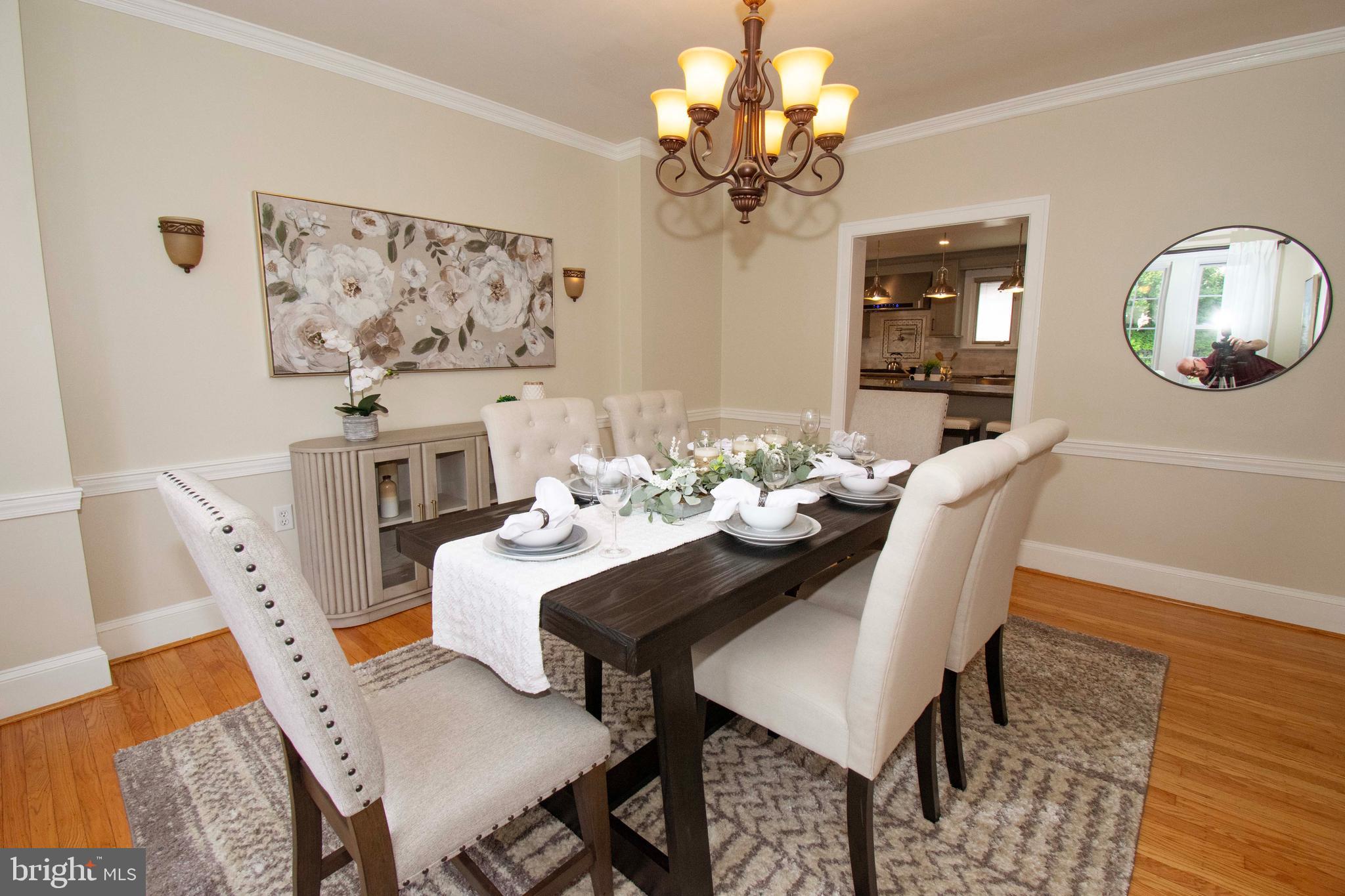 501 East Manoa Road Havertown, PA 19083 - Photo 16 of 42 a view of a dining room with furniture and chandelier