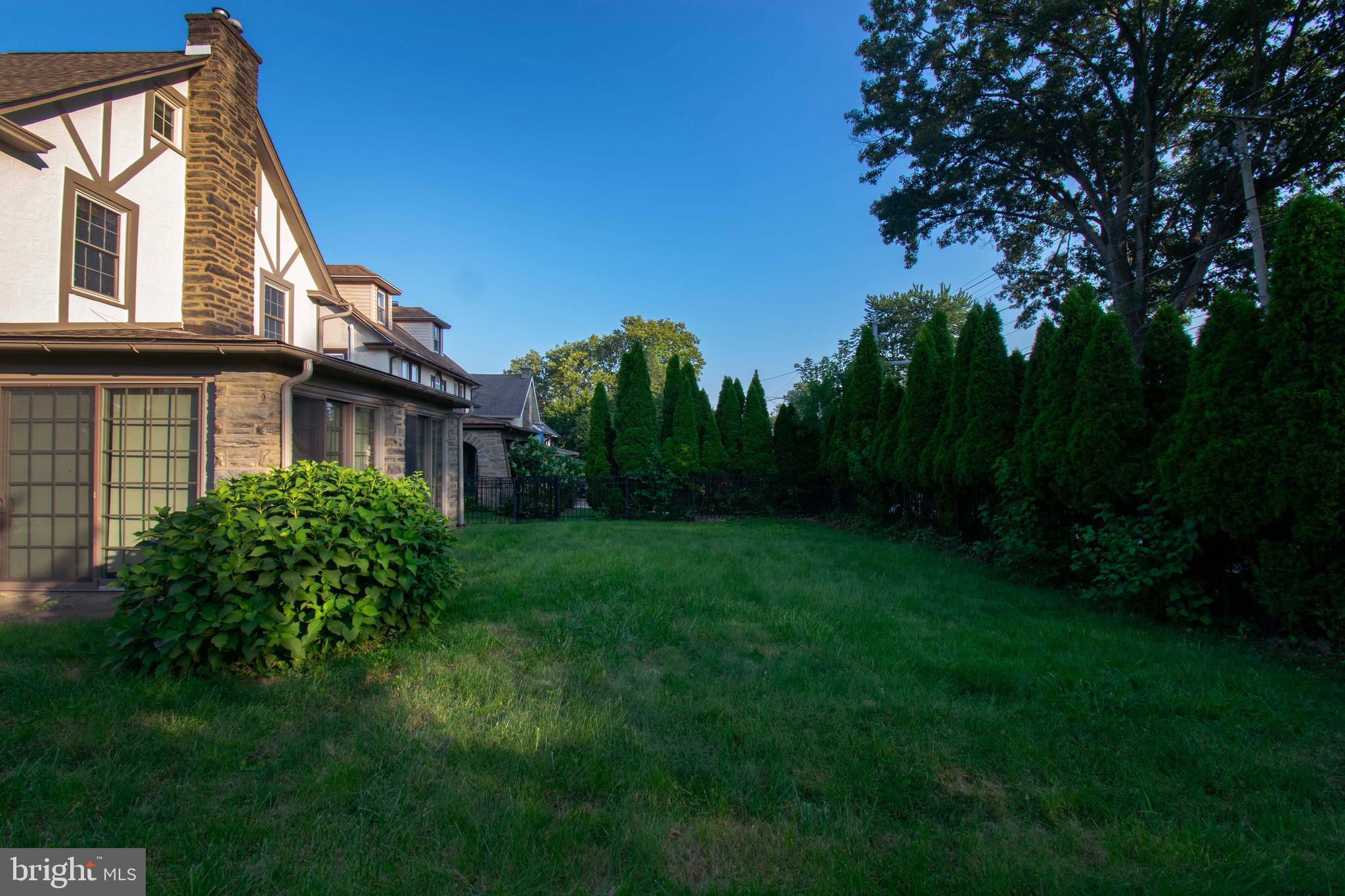 501 East Manoa Road Havertown, PA 19083 - Photo 40 of 42 a view of a house with backyard and garden