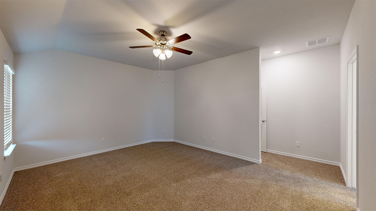 700 Gauge Road Thorndale, TX 76577 - Photo 12 of 22 Spare room featuring light carpet, a ceiling fan, and recessed lighting