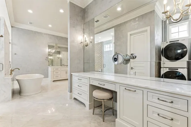 a spacious bathroom with a granite countertop sink a toilet and a mirror