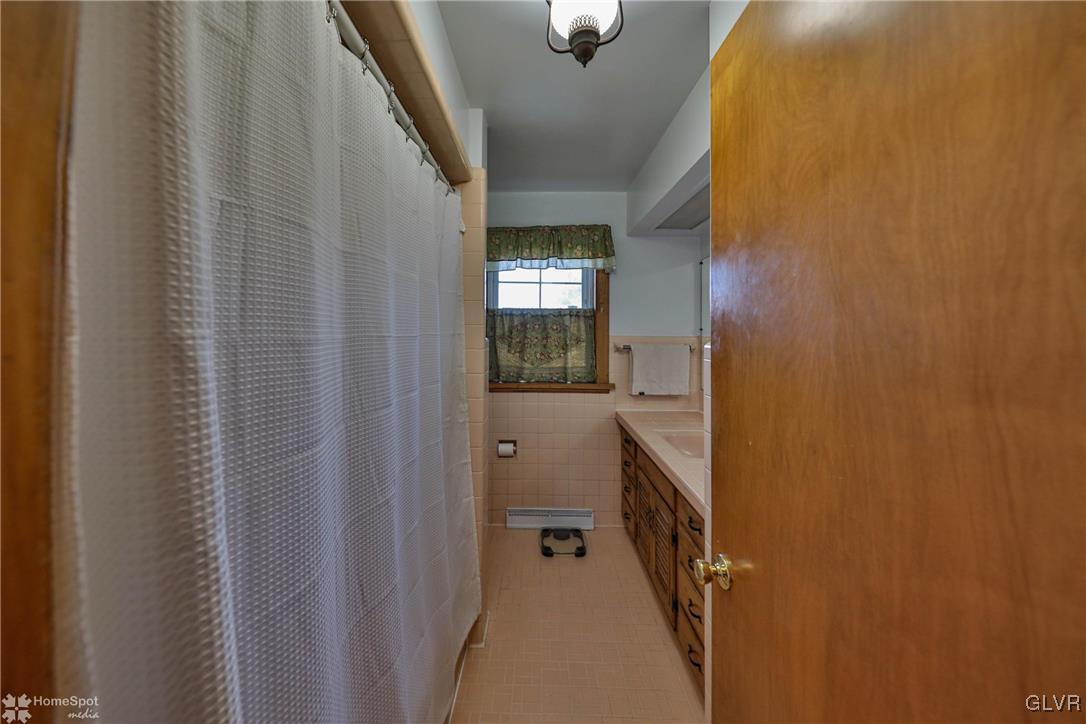 526 West Moorestown Road Nazareth, PA 18064 - Photo 22 of 50 a bathroom with a sink and a mirror