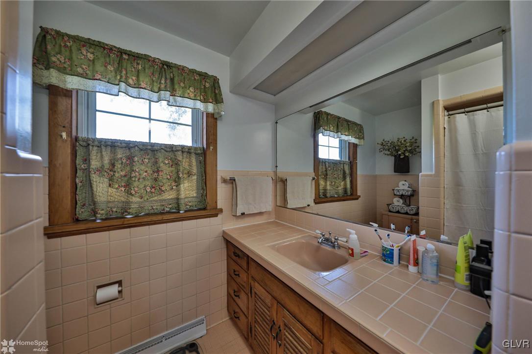 526 West Moorestown Road Nazareth, PA 18064 - Photo 23 of 50 a view of a kitchen area with furniture and windows