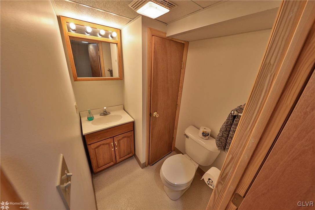526 West Moorestown Road Nazareth, PA 18064 - Photo 32 of 50 a bathroom with a granite countertop sink toilet and shower a mirror