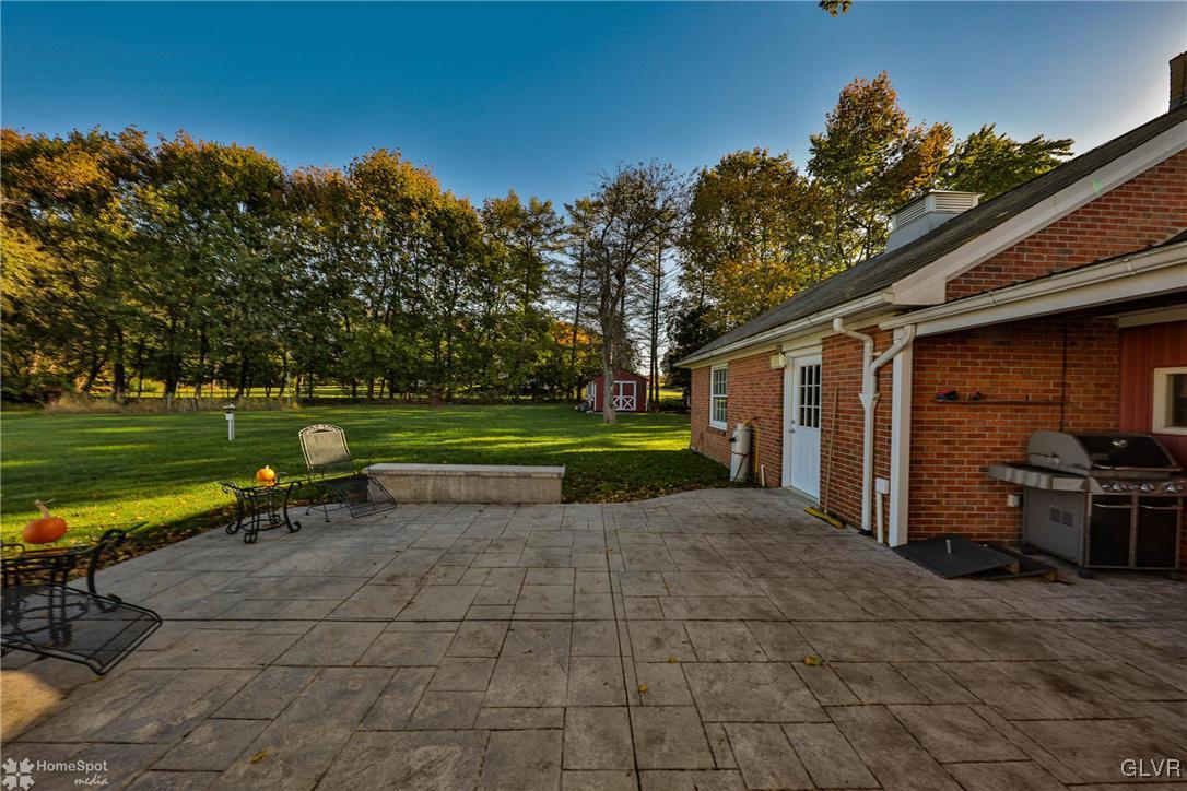 526 West Moorestown Road Nazareth, PA 18064 - Photo 43 of 50 a view of a house with backyard and a patio
