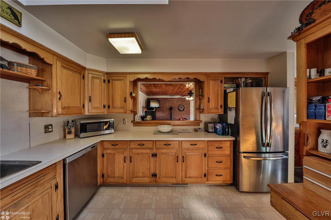 526 West Moorestown Road Nazareth, PA 18064 - Photo 6 of 50 a kitchen with a refrigerator and a sink