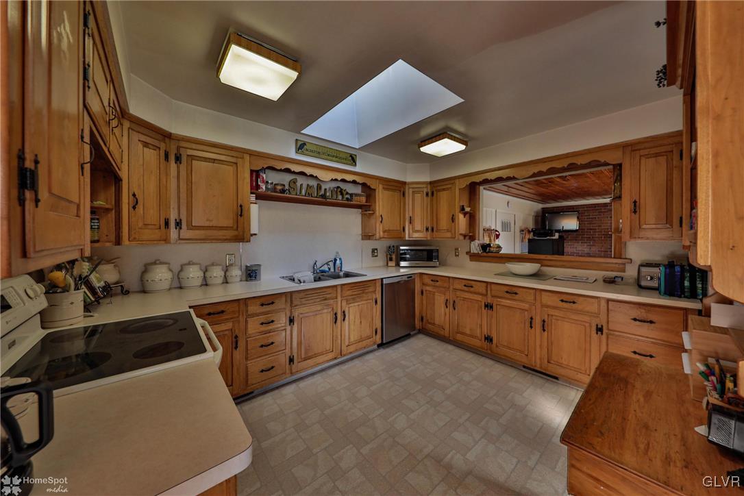 526 West Moorestown Road Nazareth, PA 18064 - Photo 8 of 50 a large kitchen with stainless steel appliances granite countertop a sink and cabinets