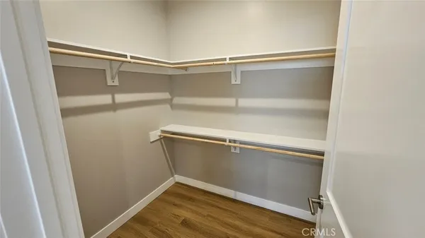 a view of an empty walk in closet