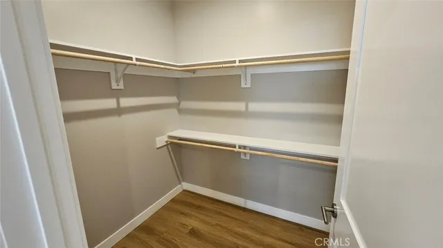 a view of an empty walk in closet
