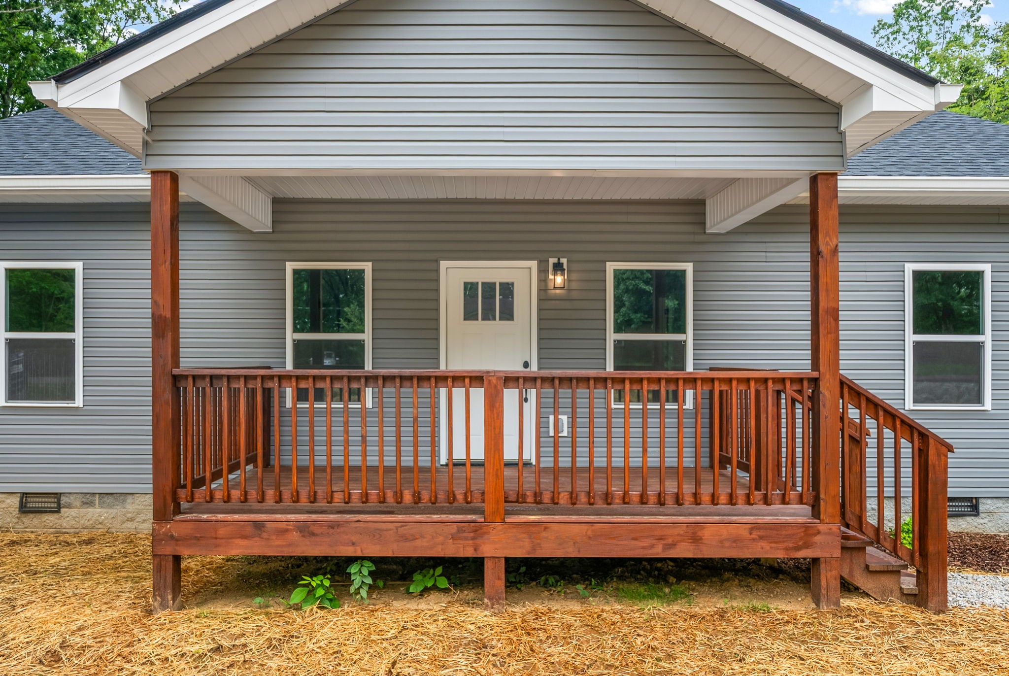 690 Brazzle Road Waverly, TN 37185 - Photo 5 of 35 a view of a deck with a bench