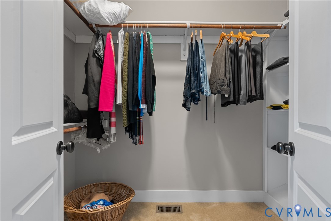 11630 Barrows Ridge Lane Chesterfield, VA 23838 - Photo 33 of 50 a view of walk in closet with clothes and shoes