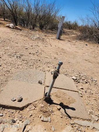 a view of a covered with snow in the middle of a yard