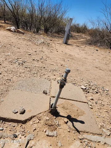 a view of a covered with snow in the middle of a yard