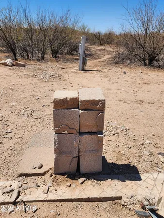 a view of ocean beach and mountain