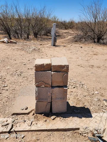a view of ocean beach and mountain