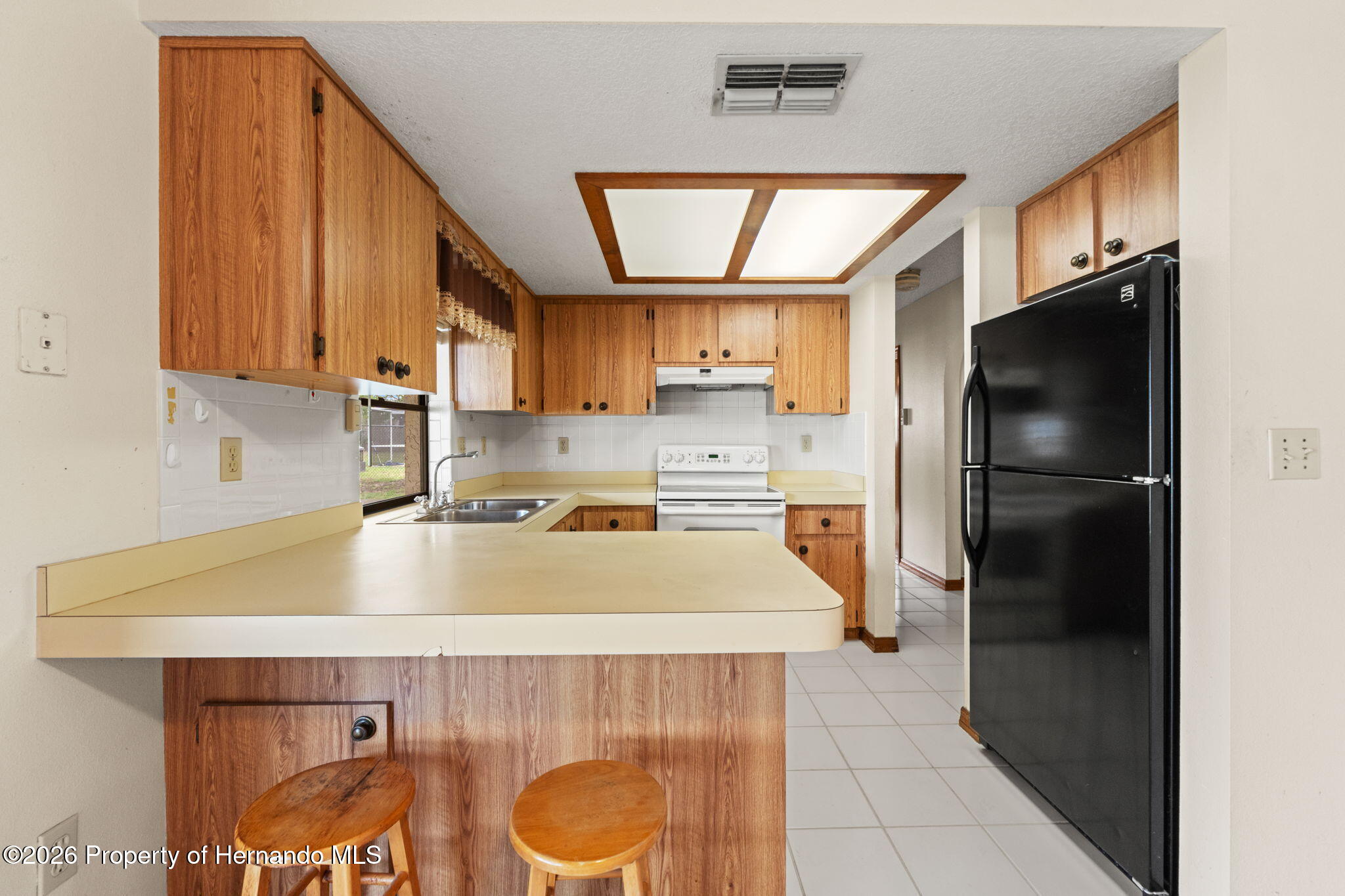 11312 Sedgefield Avenue Spring Hill, FL 34608 - Photo 12 of 28 kitchen