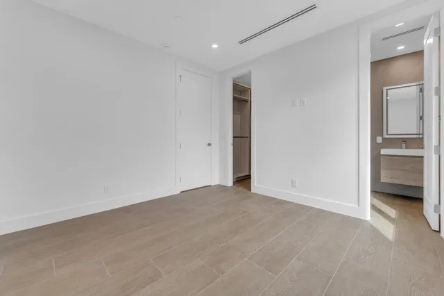 a view of a room with a large window