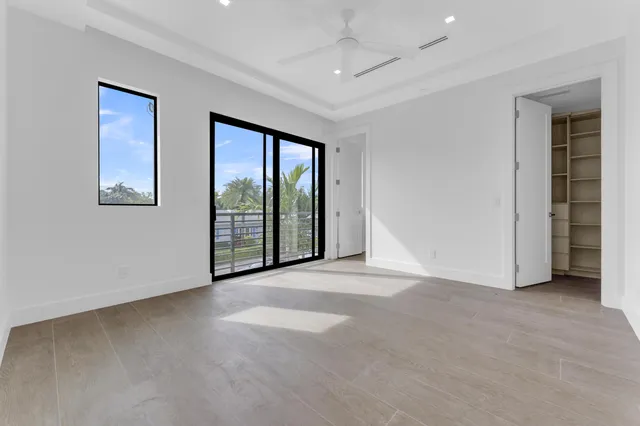 an aerial view of a house with outdoor space