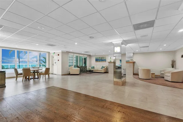 an outdoor space with furniture and umbrella