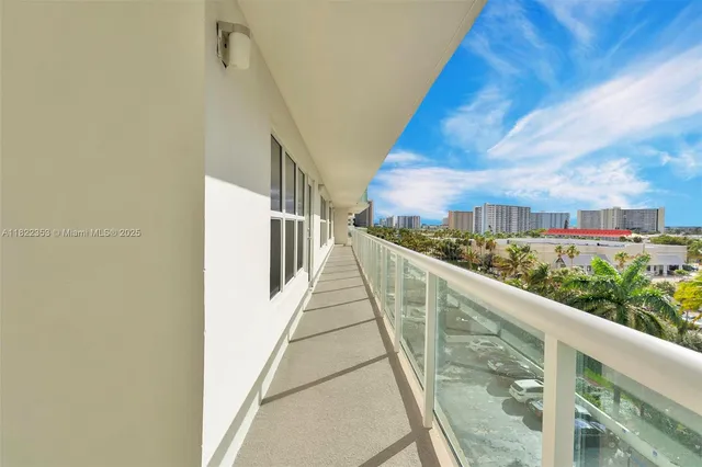 a view of balcony with furniture