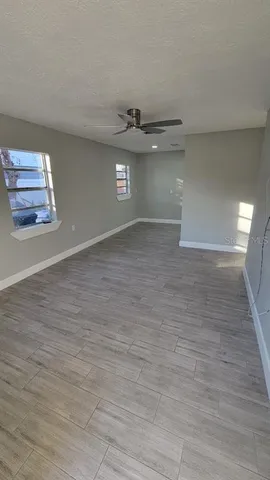 a view of an empty room and window