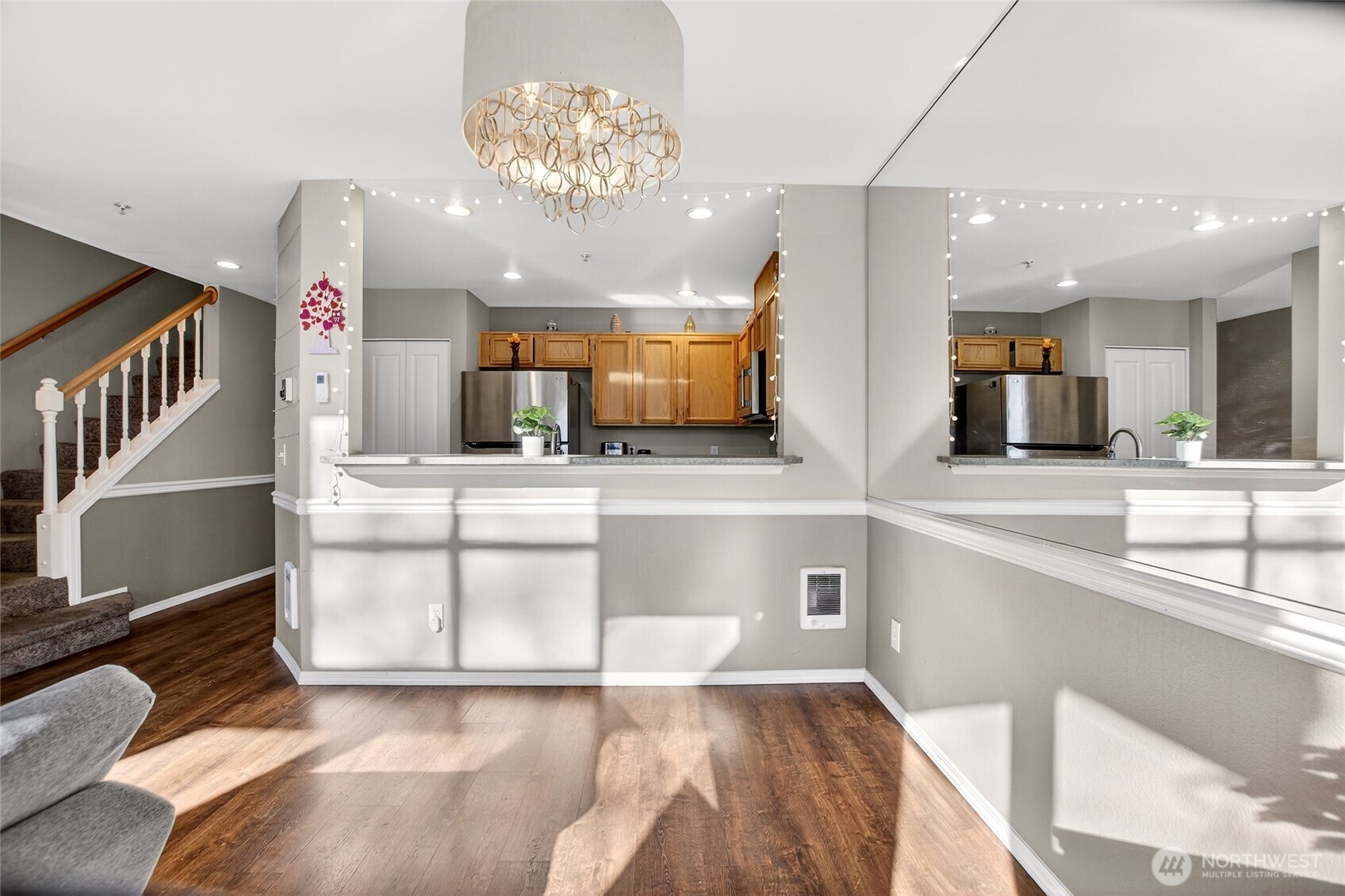 6615 South 239th Place, Unit R109 Kent, WA 98032 - Photo 12 of 40 a view of a kitchen center island cabinets and stainless steel appliances