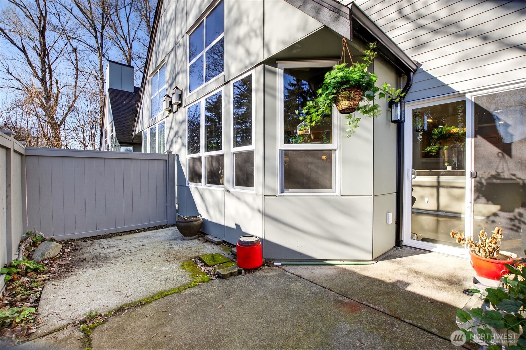 6615 South 239th Place, Unit R109 Kent, WA 98032 - Photo 22 of 40 a view of a house with a garage