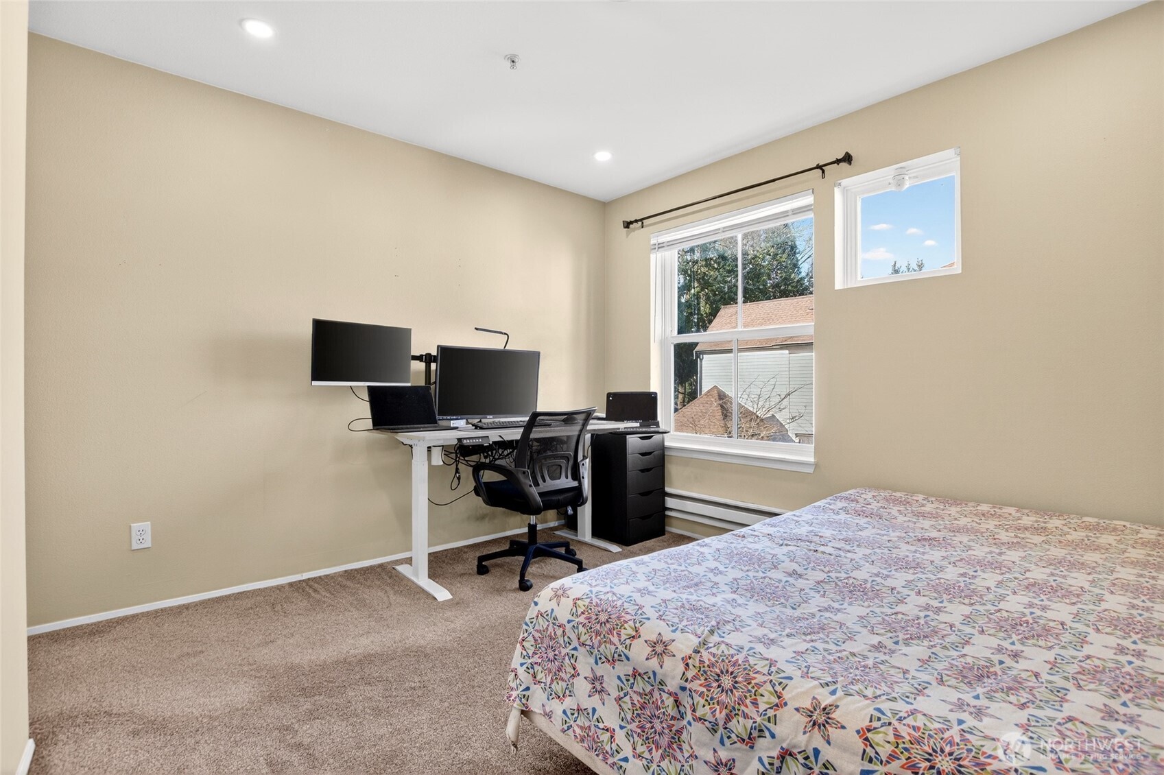 6615 South 239th Place, Unit R109 Kent, WA 98032 - Photo 27 of 40 a bedroom with a workspace