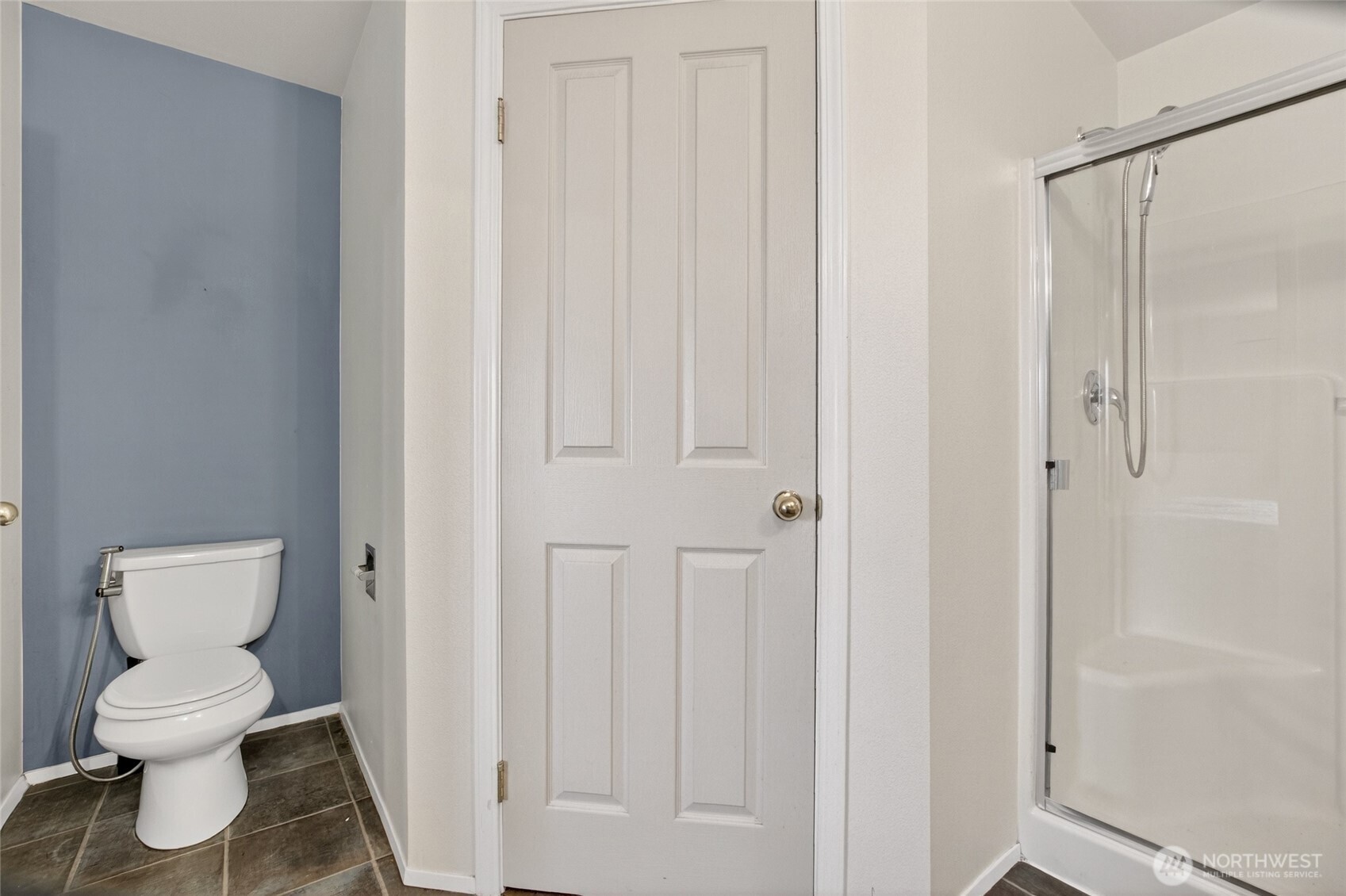 6615 South 239th Place, Unit R109 Kent, WA 98032 - Photo 33 of 40 a bathroom with a toilet