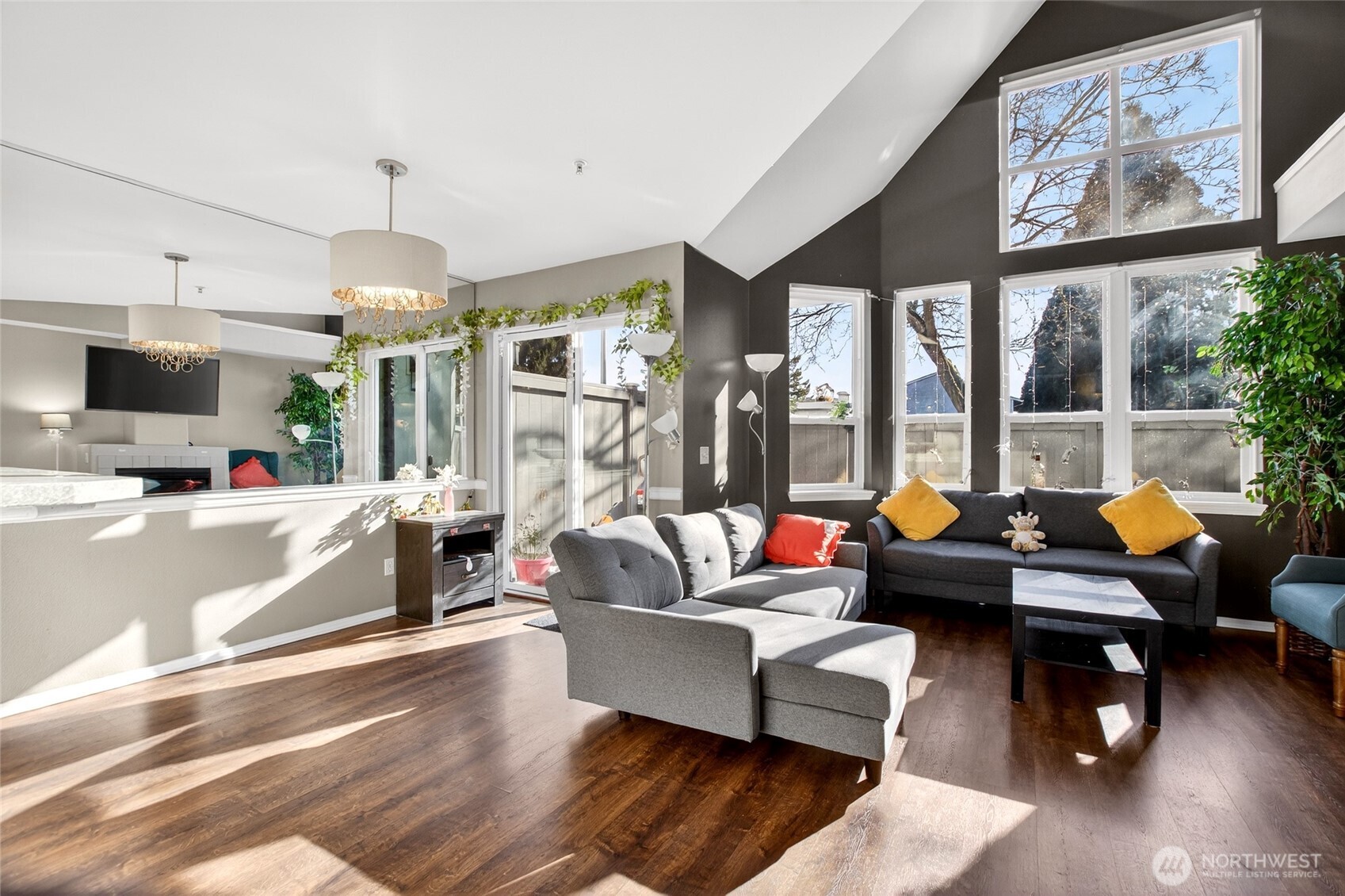 6615 South 239th Place, Unit R109 Kent, WA 98032 - Photo 5 of 40 a living room with furniture and a large window