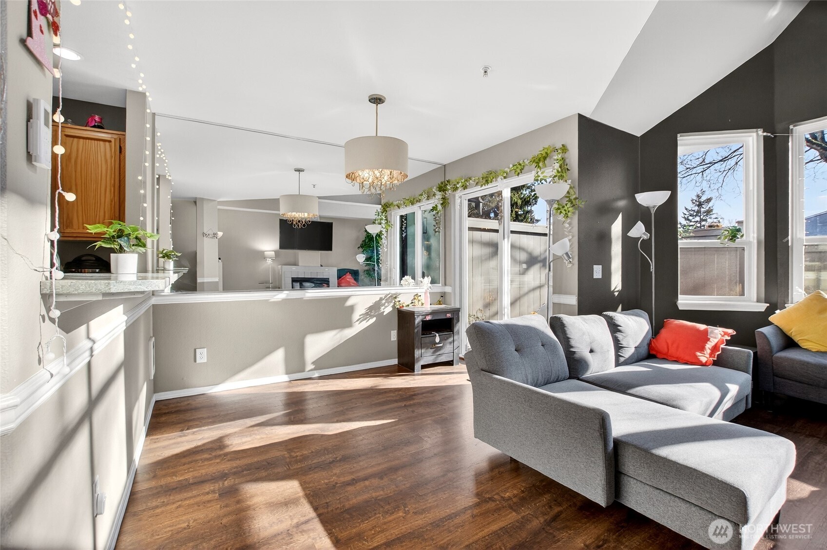 6615 South 239th Place, Unit R109 Kent, WA 98032 - Photo 8 of 40 a living room with fireplace furniture and a large window