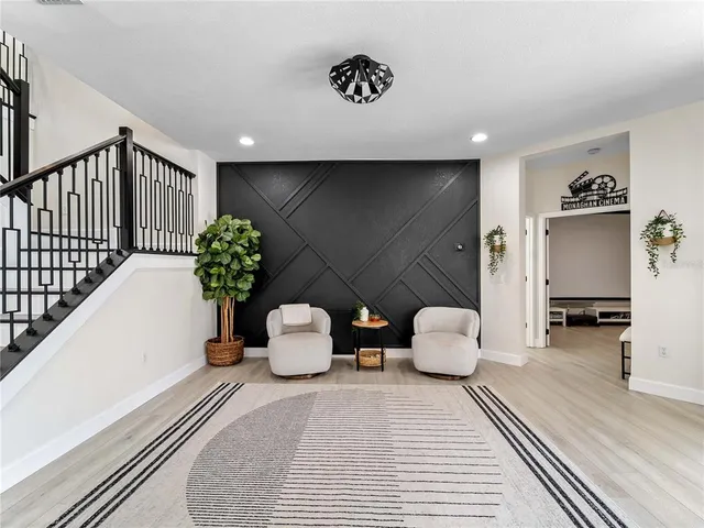 a open kitchen with stainless steel appliances granite countertop a stove and more cabinets
