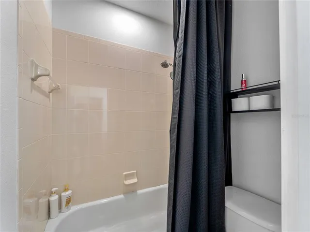 an aerial view of a house with a garden