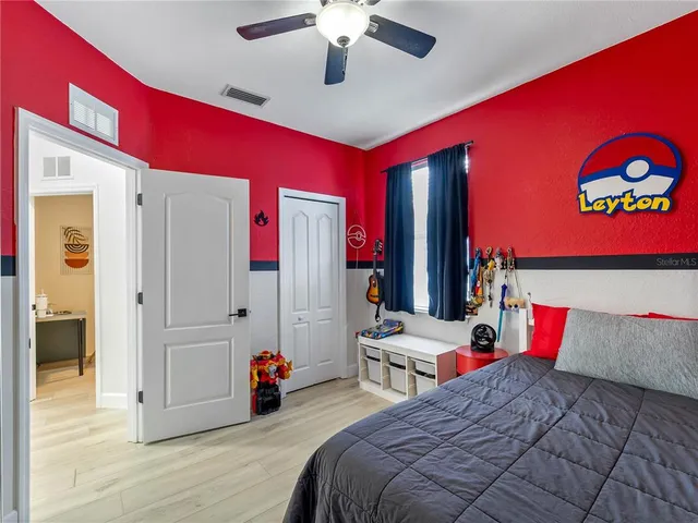 an aerial view of a house with a lake view