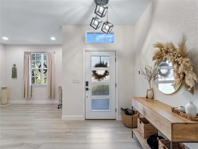 a view of a livingroom with furniture and wooden floor
