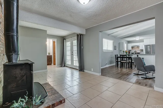 a view of a living room and dining room