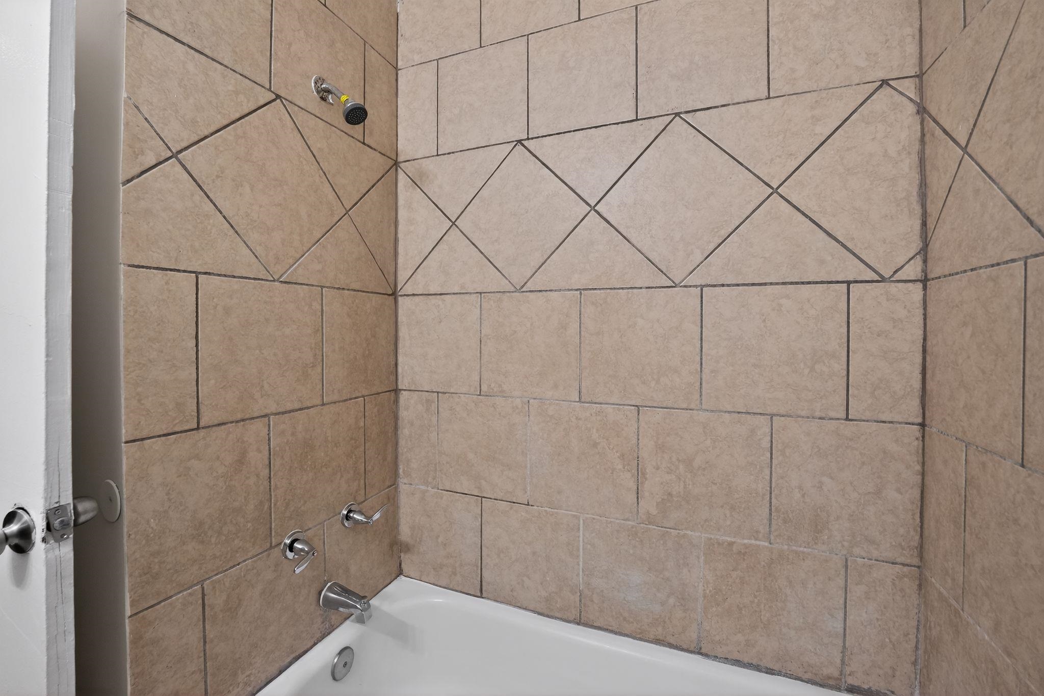 4553 Neely Road Memphis, TN 38109 - Photo 16 of 33 a bathroom with a sink and vanity