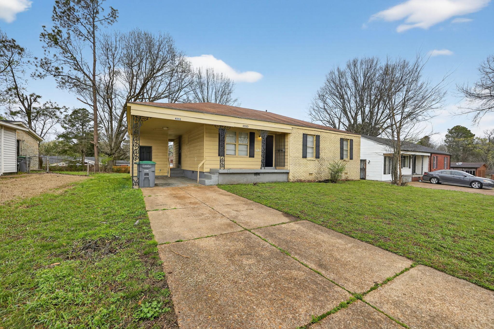 4553 Neely Road Memphis, TN 38109 - Photo 18 of 33 a front view of house with yard and green space