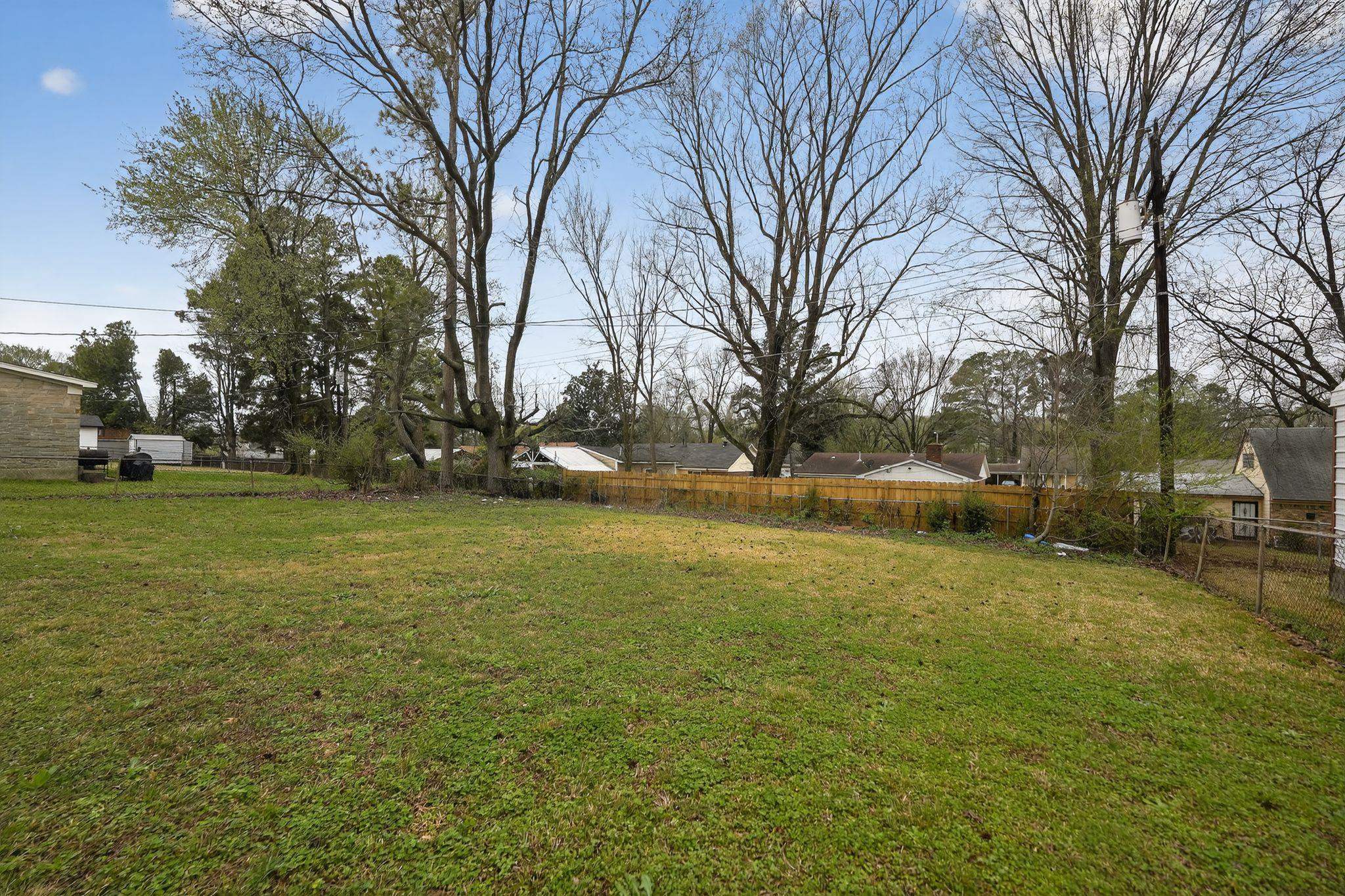 4553 Neely Road Memphis, TN 38109 - Photo 27 of 33 a view of yard with trees