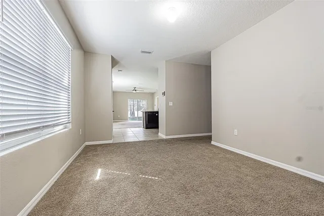 a view of empty room with a window