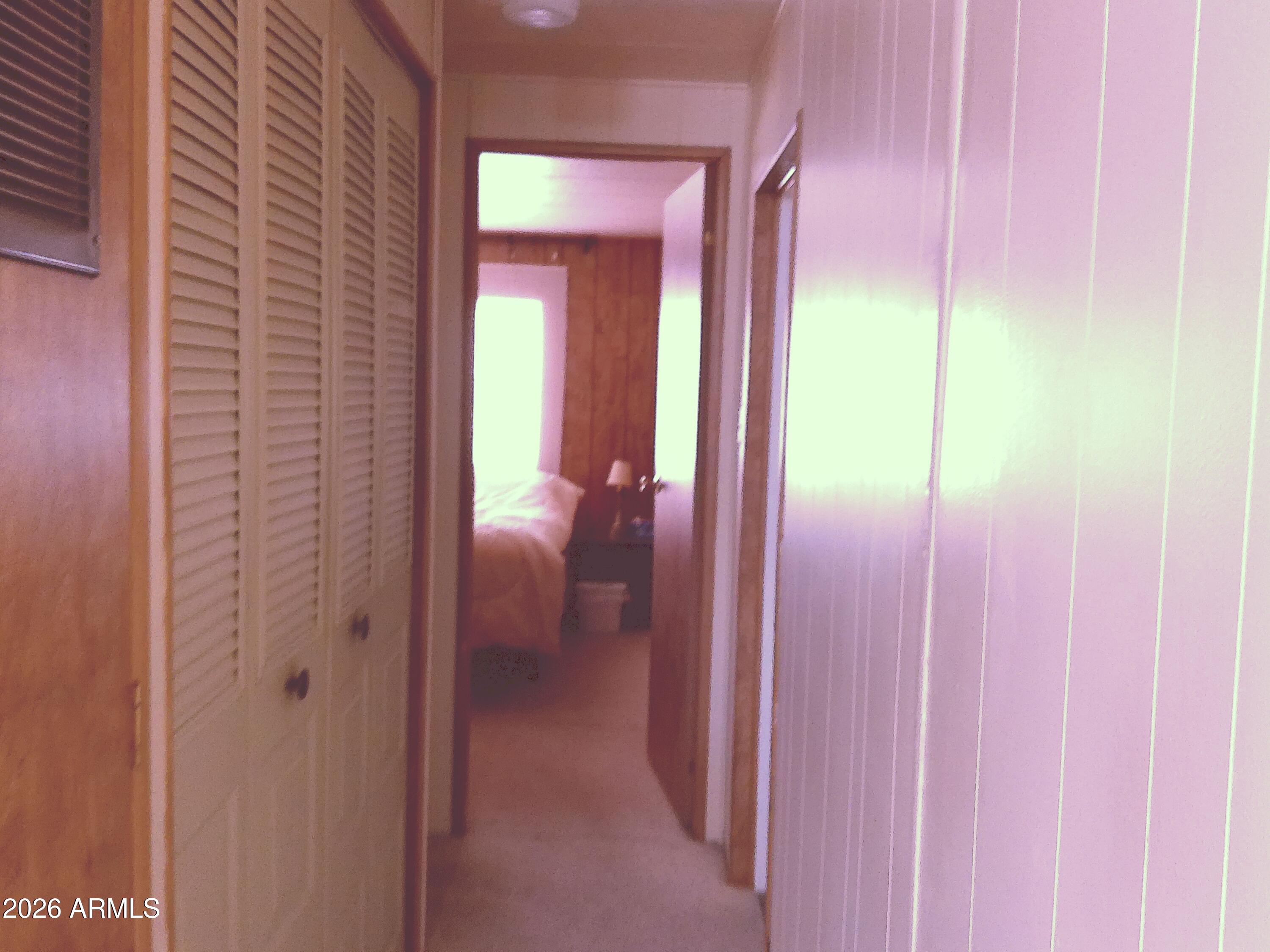 800 West Apache Trail, Unit 142 Apache Junction, AZ 85120 - Photo 14 of 33 a view of a bathroom from a hallway