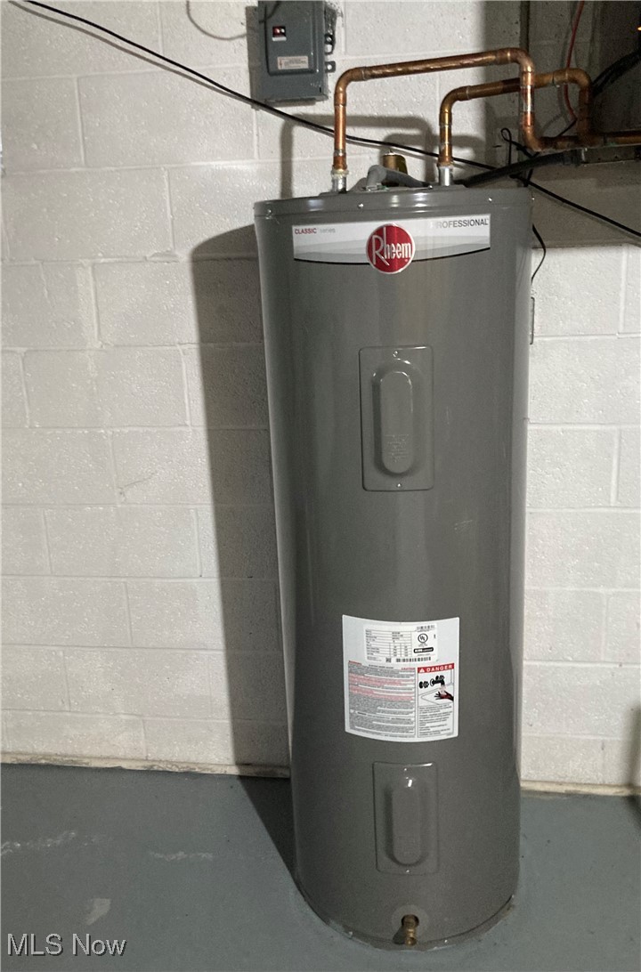 3510 Long Road Avon, OH 44011 - Photo 24 of 26 Utility room featuring water heater