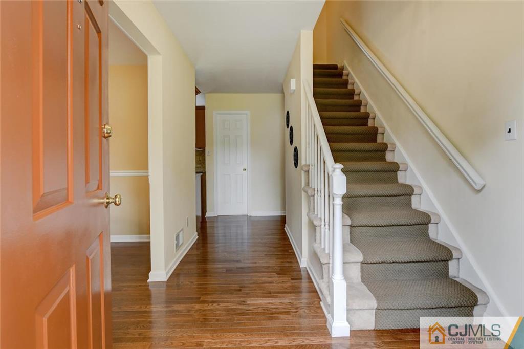 8 Vince Road Somerset, NJ 08873 - Photo 16 of 24 a view of a hallway with wooden floor and entryway