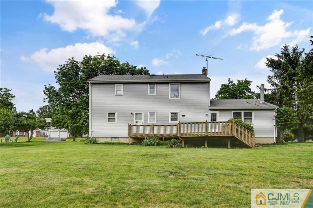 8 Vince Road Somerset, NJ 08873 - Photo 18 of 24 a house view with a garden space