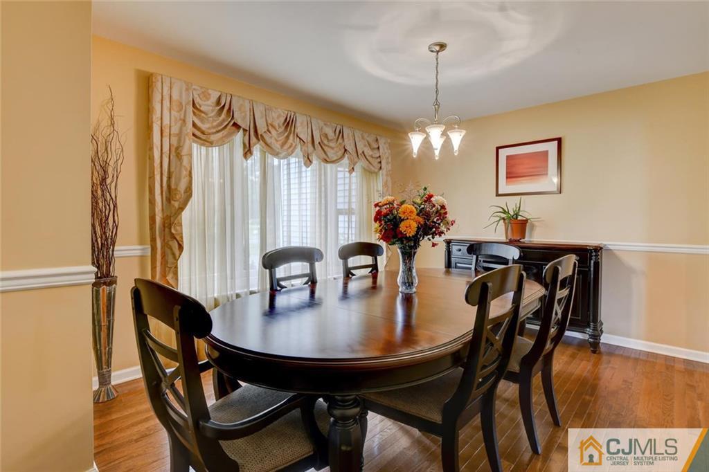 8 Vince Road Somerset, NJ 08873 - Photo 3 of 24 a dining room with furniture and window