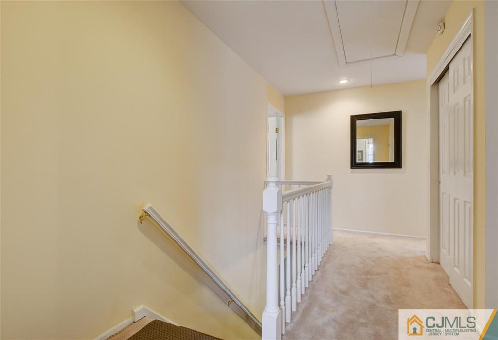 8 Vince Road Somerset, NJ 08873 - Photo 22 of 24 a view of a hallway with staircase