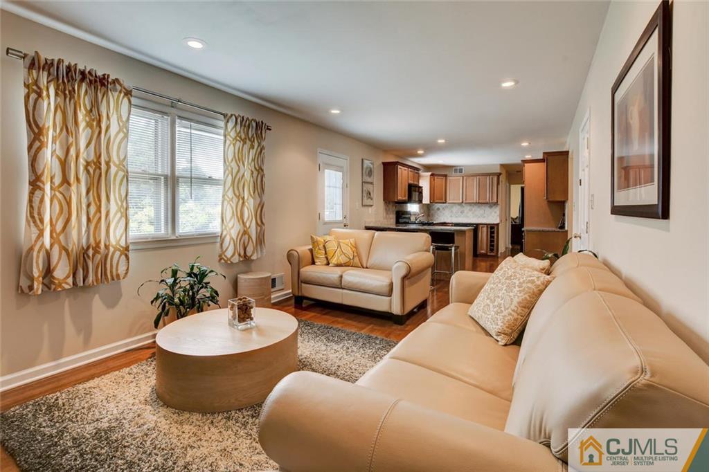 8 Vince Road Somerset, NJ 08873 - Photo 6 of 24 a living room with furniture and a large window