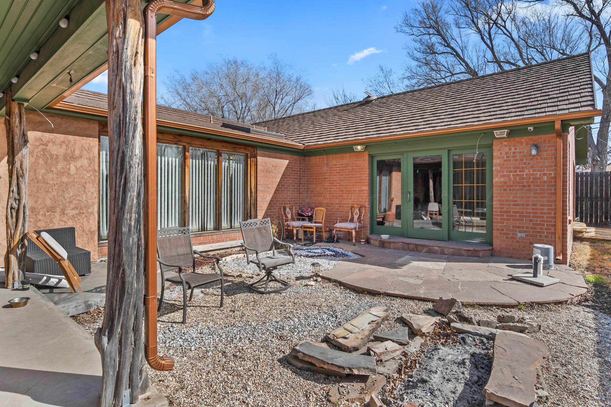 2217 Peach Tree Street Amarillo, TX 79109 - Photo 3 of 26 a building outdoor space with patio furniture