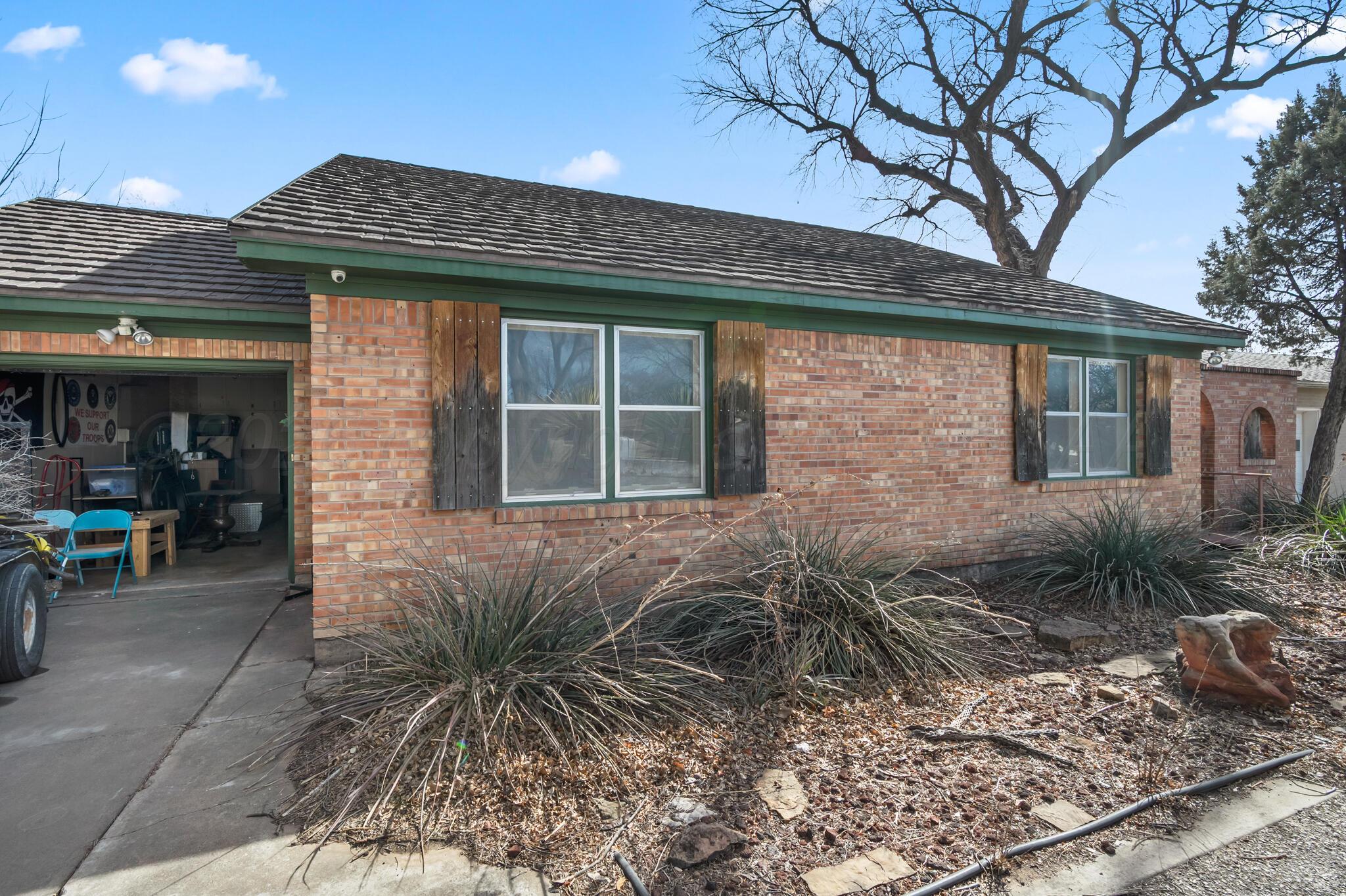 2217 Peach Tree Street Amarillo, TX 79109 - Photo 4 of 26 a house view with a outdoor space