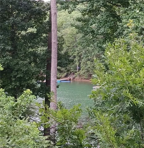a view of balcony with wooden floor